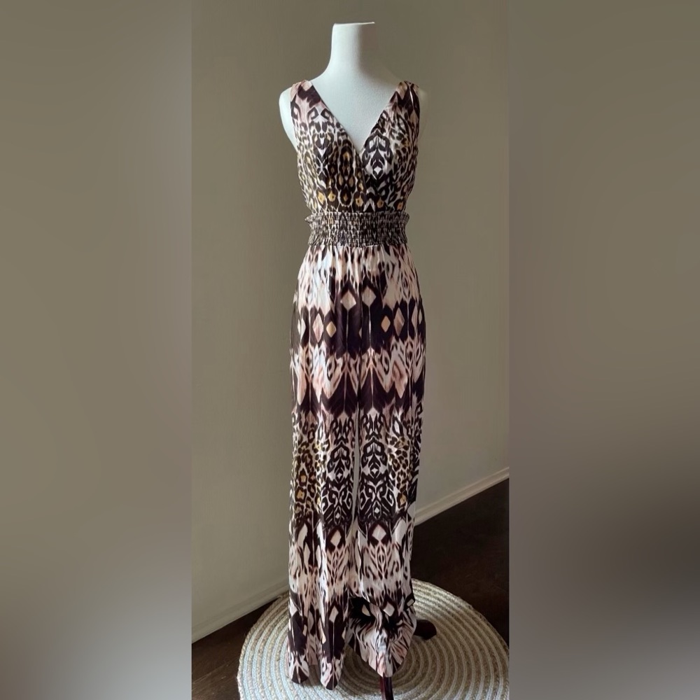 Bebe Leopard Print Smocked Romper Jumpsuit Pants size S NWT